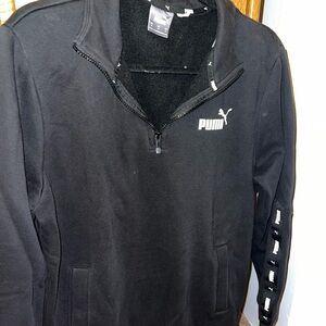Black puma sweater.